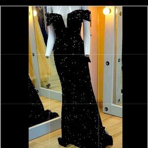 Beautiful black sequence dress. Used once for a event. Has stretch